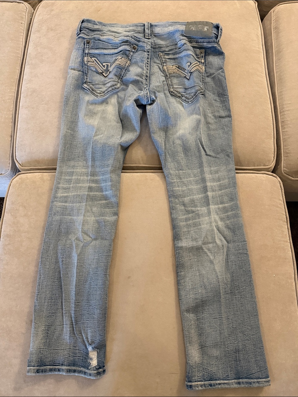 American Fighter light blue denim jeans with orange trim
